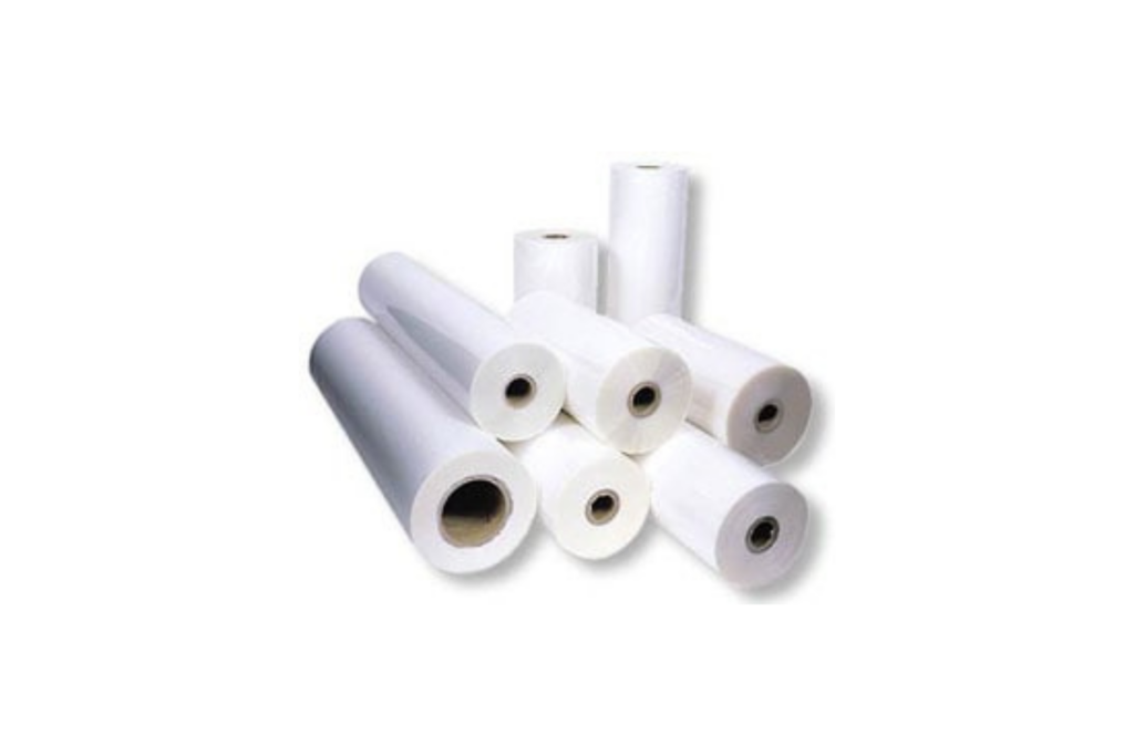 A collection of white laminating film rolls, neatly stacked and arranged in various sizes. The rolls are displayed on a white background, showcasing their cylindrical shape and smooth surfaces.